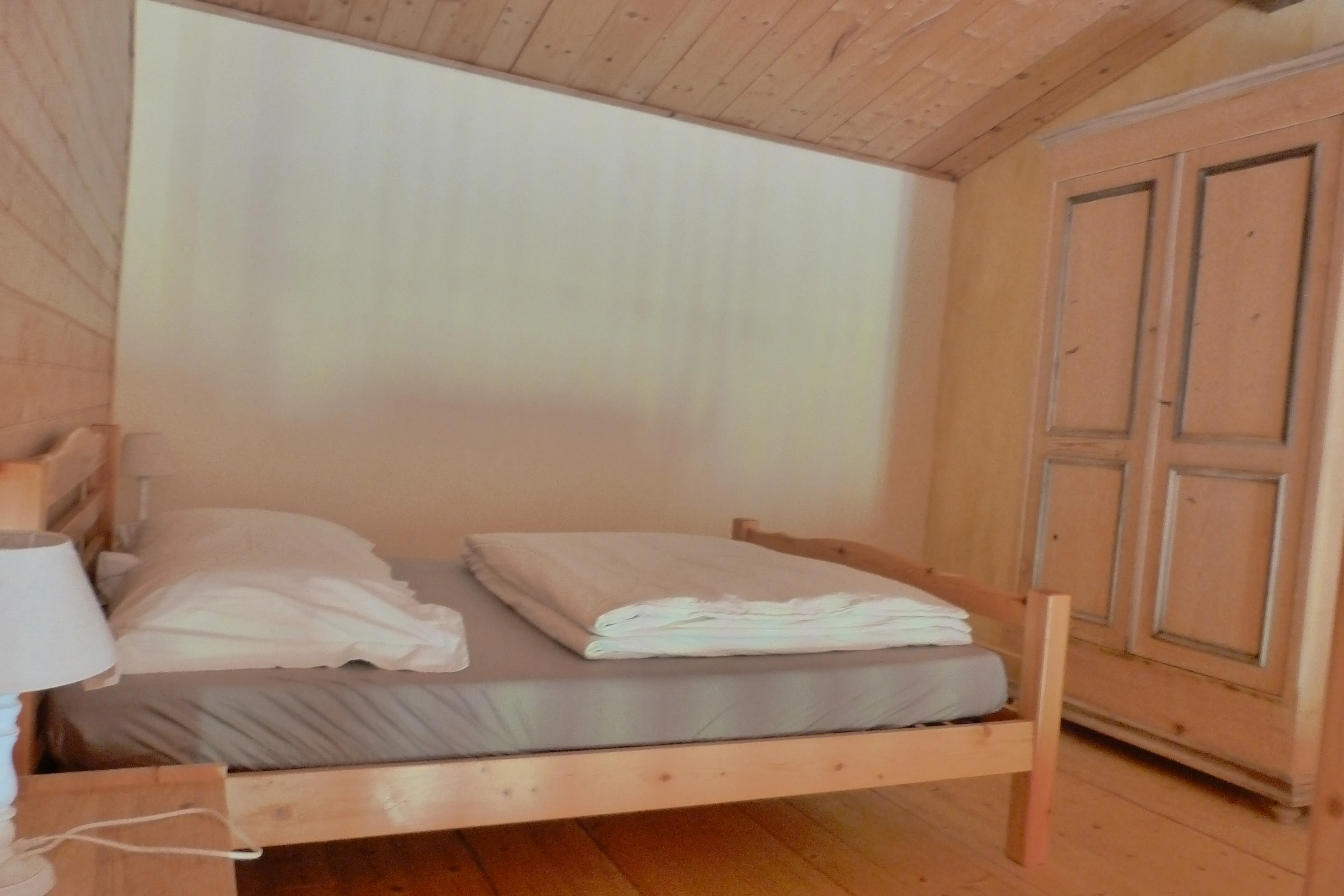 Chambre de l'appartement Gentiane Jaune